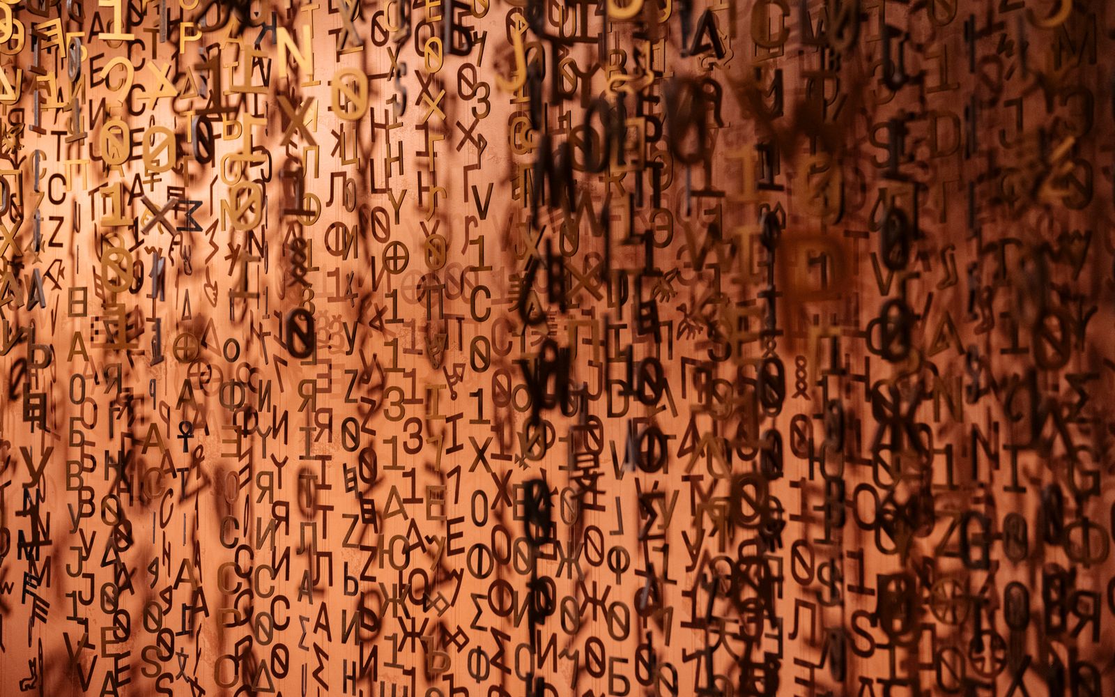 Abstract display of floating letters creating a creative visual texture.